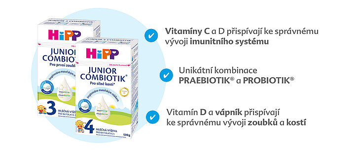 Tři krabice výrobku s názvem "Junior Combiotik" s etiketami v cizím jazyce a třemi zdůrazněnými klíčovými vlastnostmi: přítomností vitaminu D, jedinečnou kombinací prebiotik a významem těchto složek pro zdravý imunitní systém.